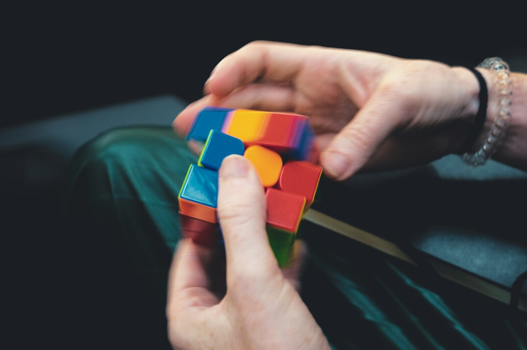 person solving puzzle